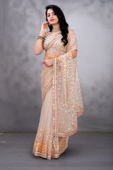 Golden embroidered fully stitched saree