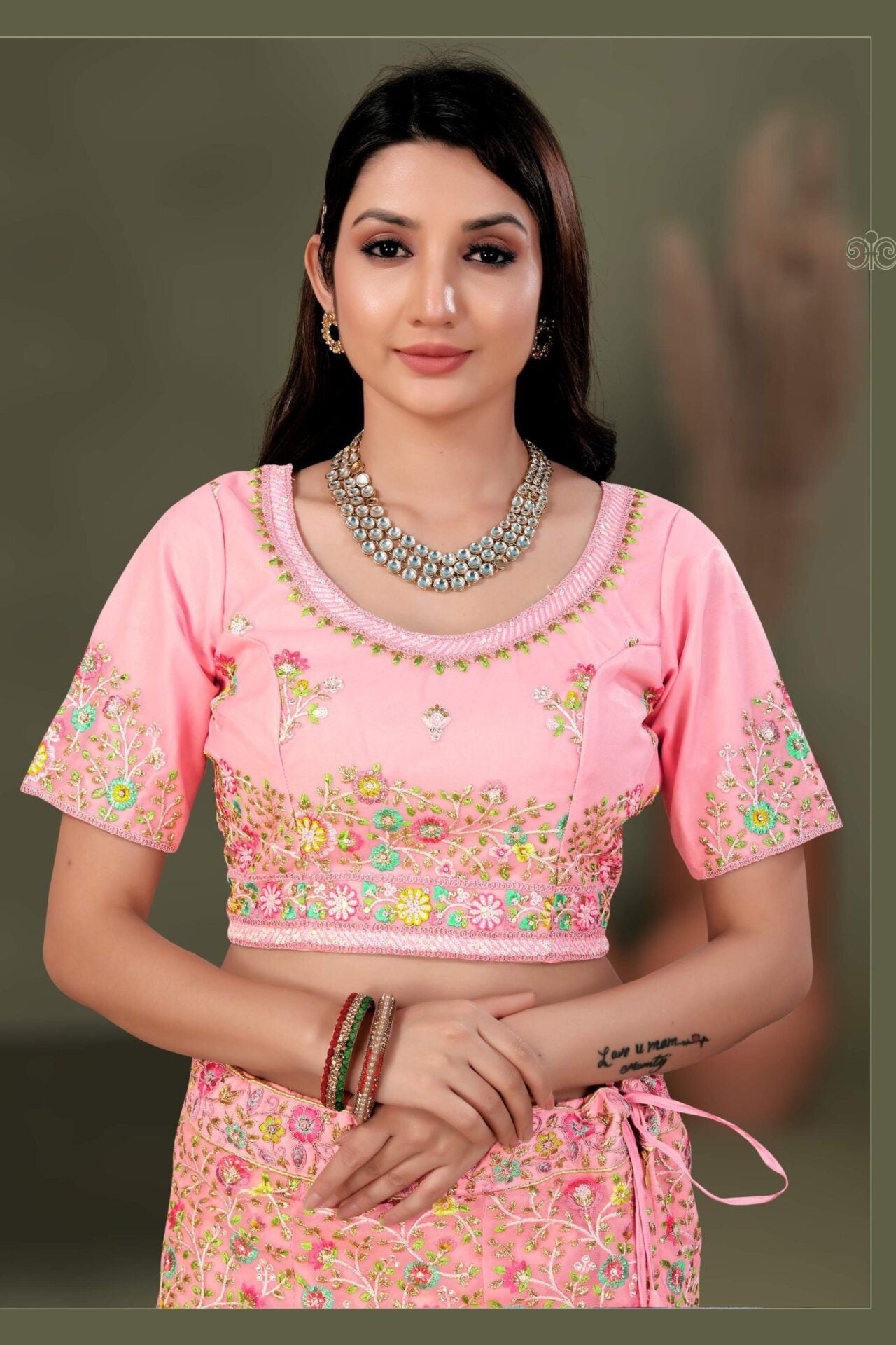 Light Pink Lehenga Choli Embellished With Multicolored Thread Work