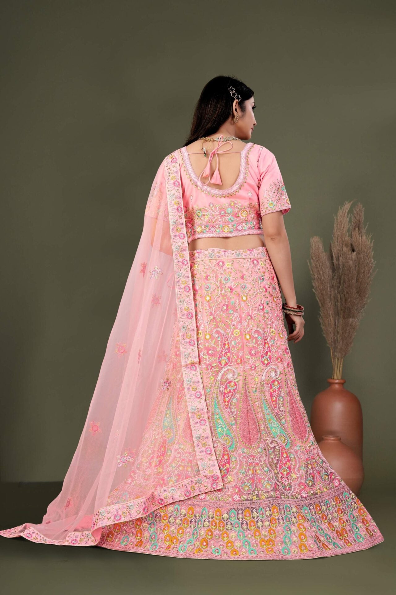 Light Pink Lehenga Choli Embellished With Multicolored Thread Work