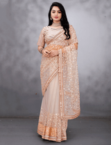 Golden embroidered fully stitched saree