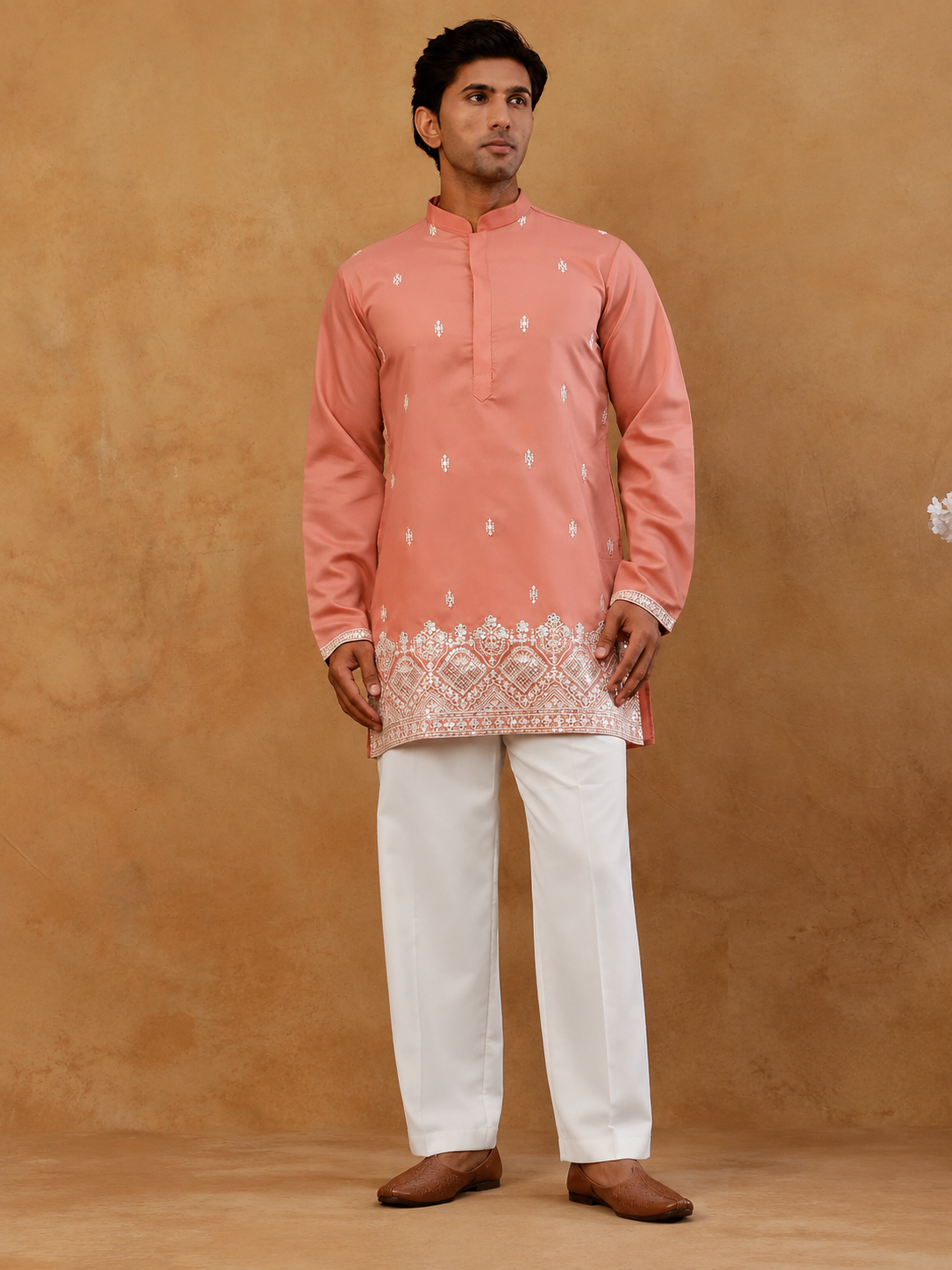 Full-length pink embroidered kurta with white pajama