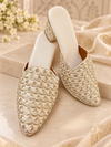 Ivory embroidered mules for women with gold pattern detailing