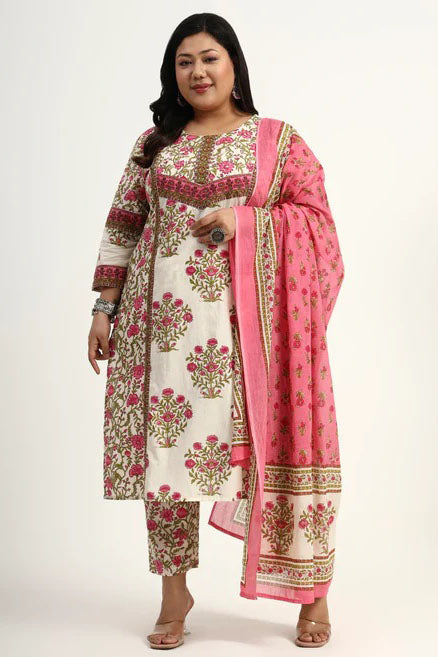 Woman wearing a traditional outfit with a pink dupatta on a white background