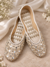 White bridal Punjabi jutti for women with silver mirror embellishment